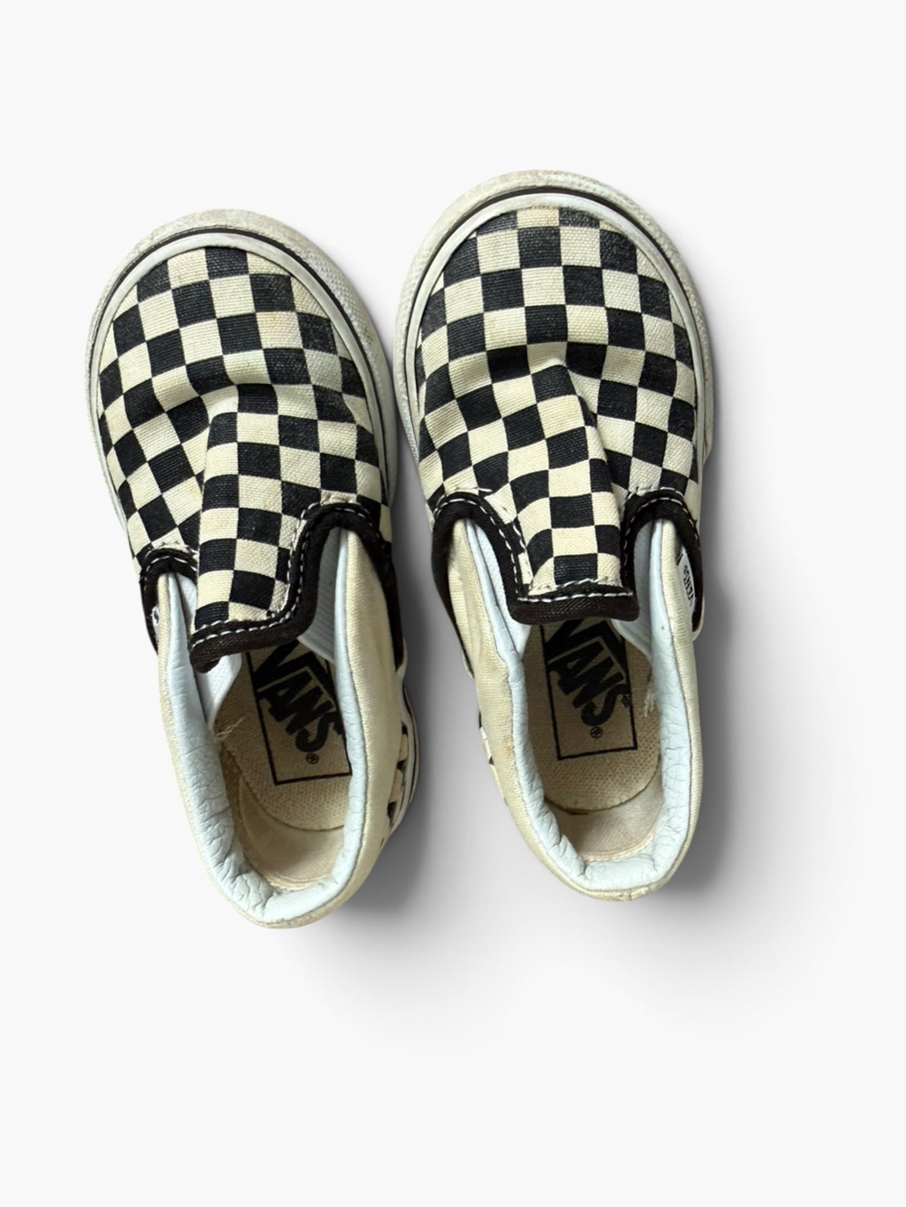 Vans Classic Slip-On Checkered Slip-On Sneakers in Black & White